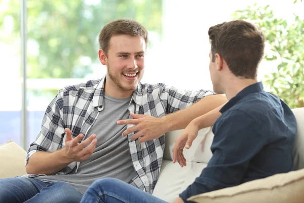 depositphotos_130760650-stock-photo-two-friends-talking-at-home